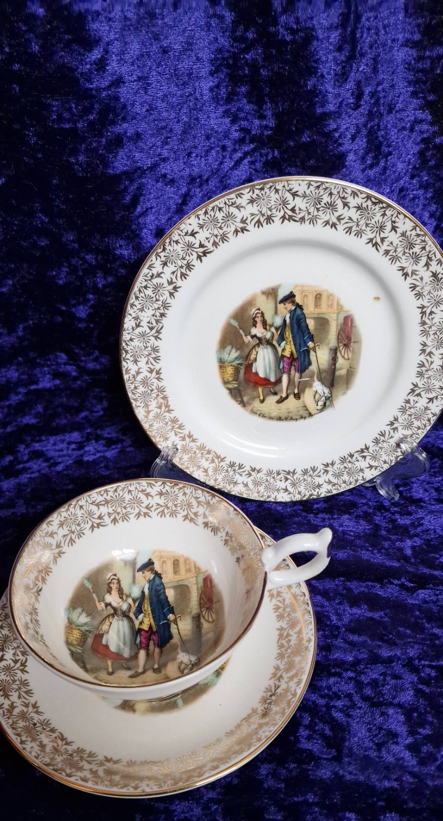 Fine Black Cherries Pattern china cups,saucers and side plate with man and woman illustration in Tea Trio set.