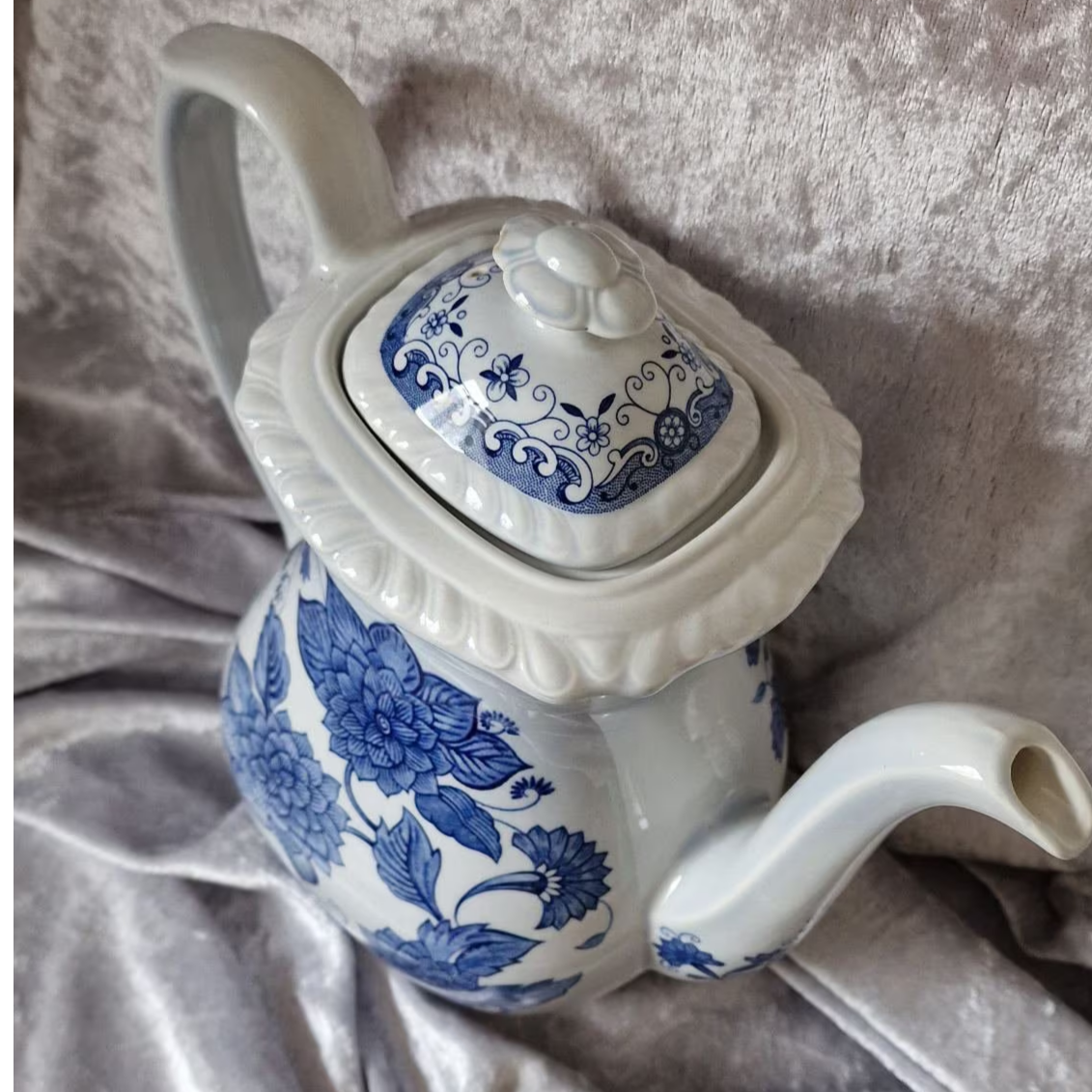 Elegant Adams 'Blue Butterfly' porcelain teapot featuring a beautiful blue and white floral pattern.