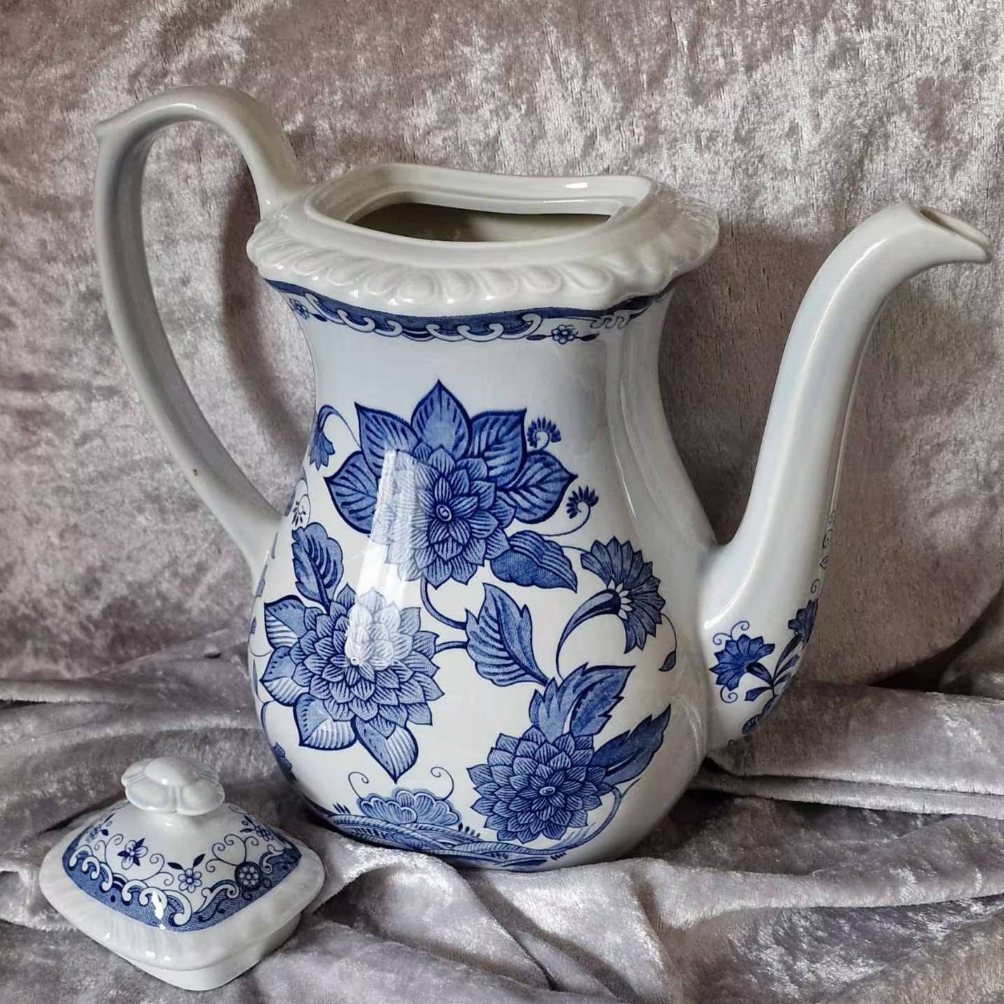Elegant Adams 'Blue Butterfly' porcelain teapot featuring a beautiful blue and white floral pattern.