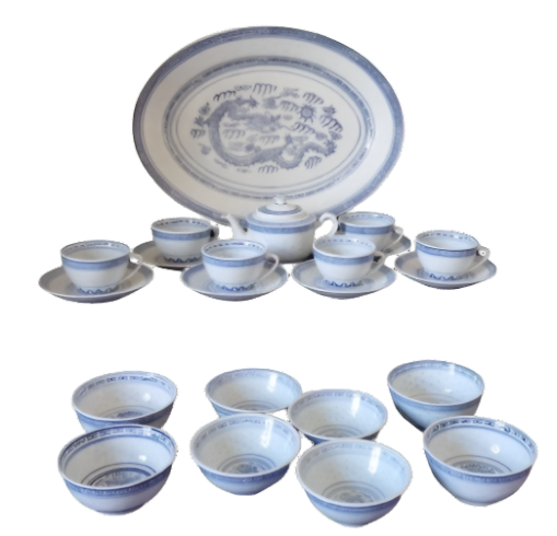 A Chinese tea set featuring a blue and white design, consisting of a bowl and cups.